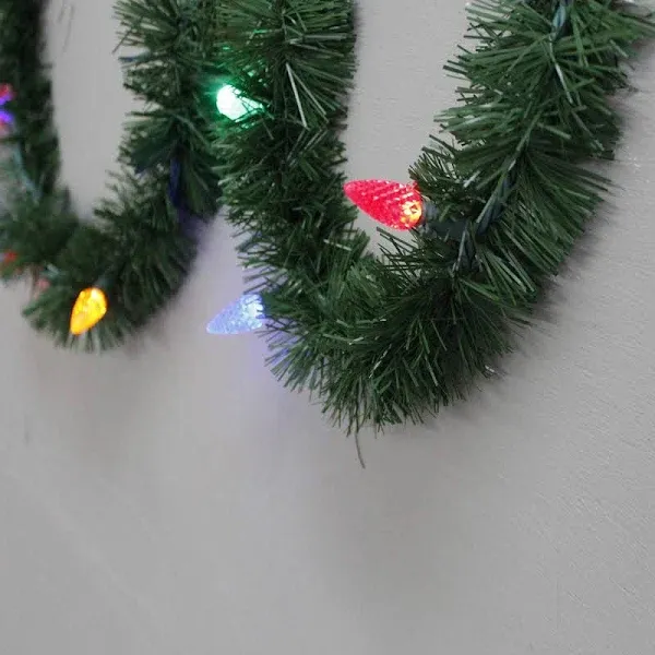 Brite Star 18' Pre-Lit Green Pine Artificial Christmas Garland with Multi LED C6 Lights